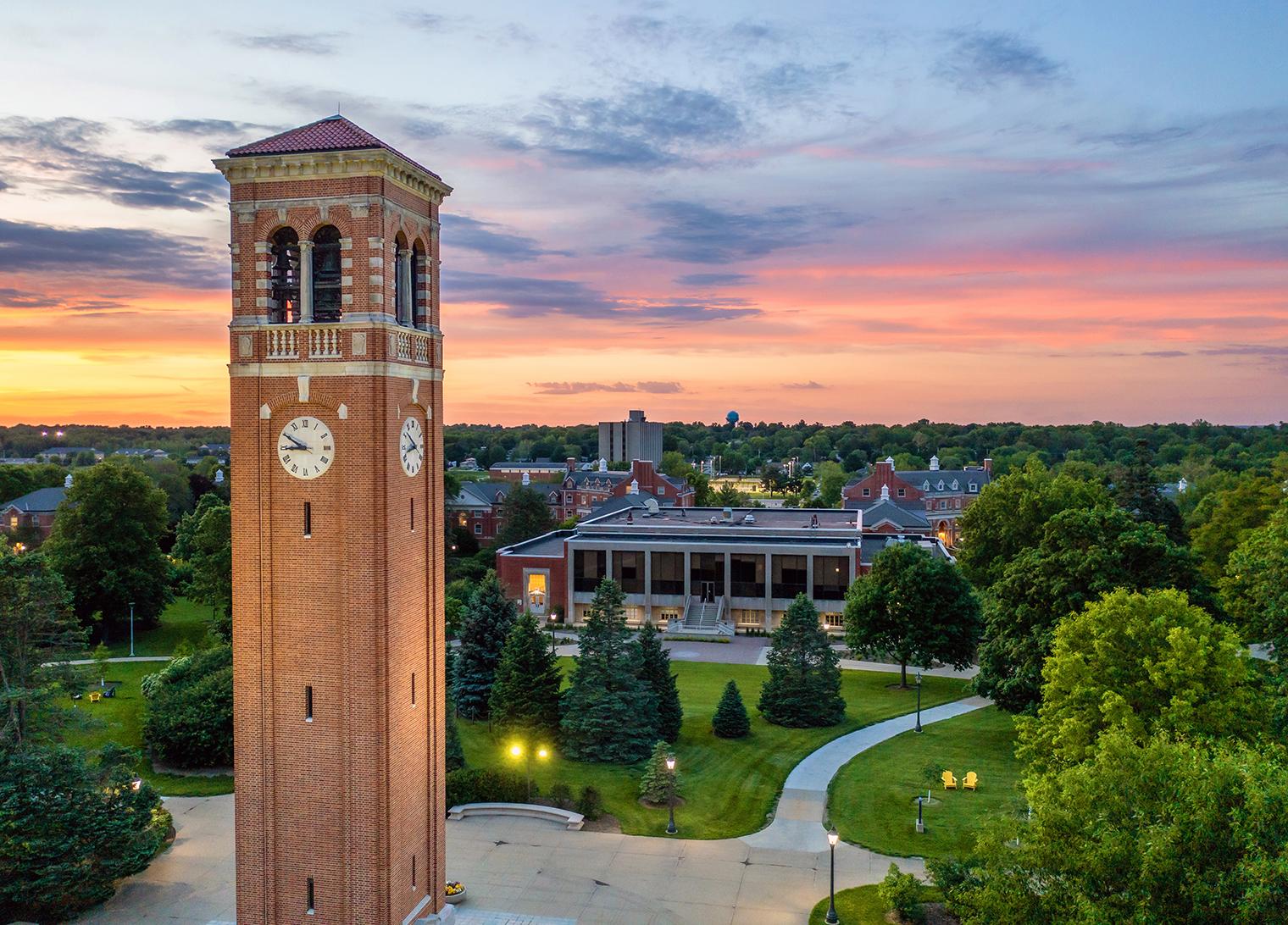 Picture of UNI campus at sunset with a focus on the campanile.